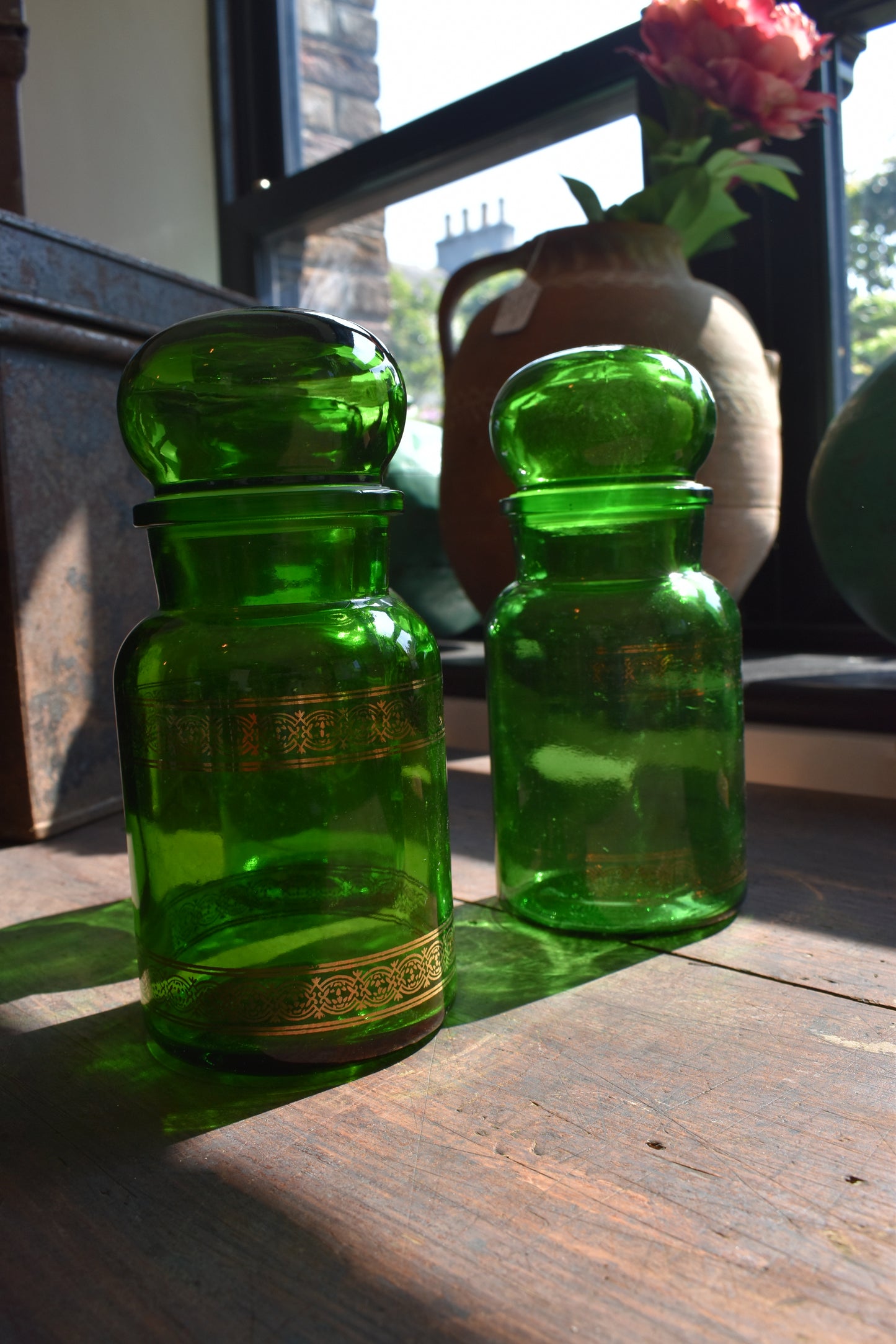 Three Green Pharmacy Bottles